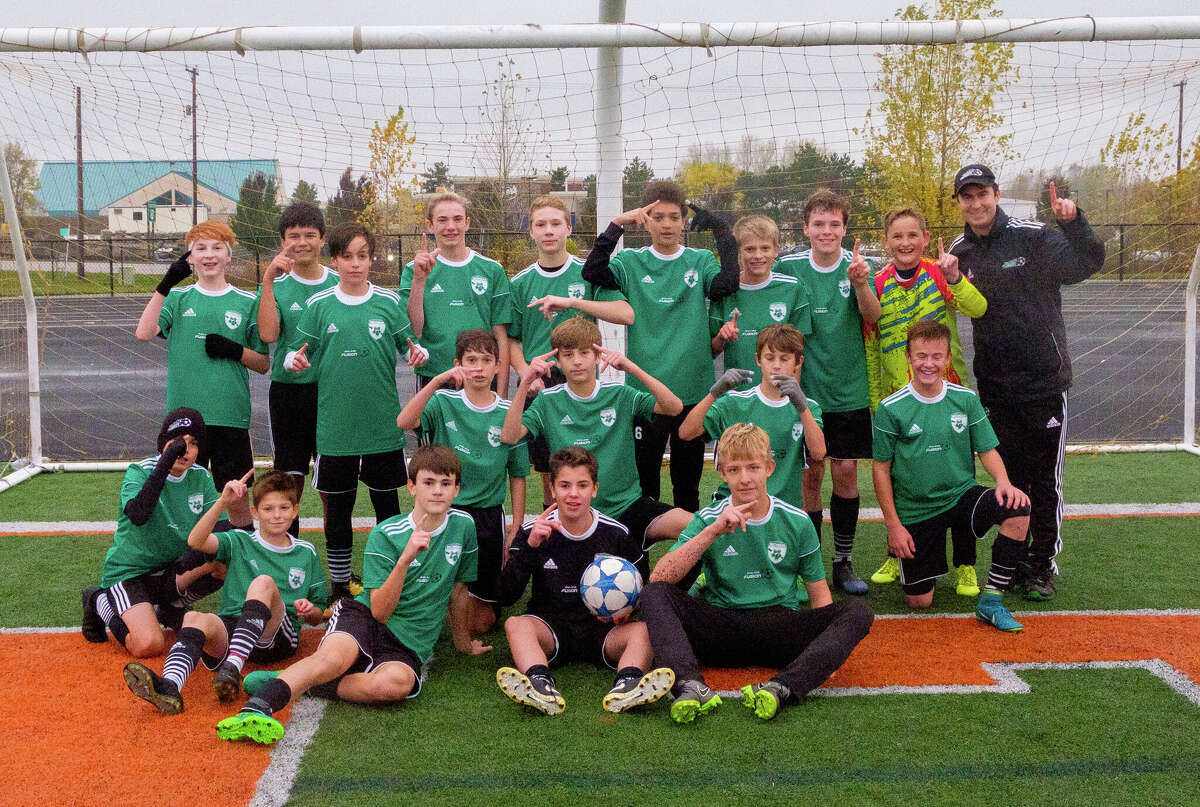Members of the Midland Fusion ’04 boys’ soccer team which won the 2017 Michigan Premier 2 championship are (front, from left) Drew Soto, Jonah Dahn, Jeb Snead, Carson Snyder, Carsen Jenkins; (middle, from left) Tyler Sanchez, Lance Coleman, Isaac Skinner, Luke Johnson; and (back, from left) Brennan Mahokey, Justin Schafer, Santiago Lopez, Kyler Gebhard, Jack Wolohan, Jensen Powell, Ian Metzler, Frake DeSmet, Kevin Groh, and coach Doug Dahn.