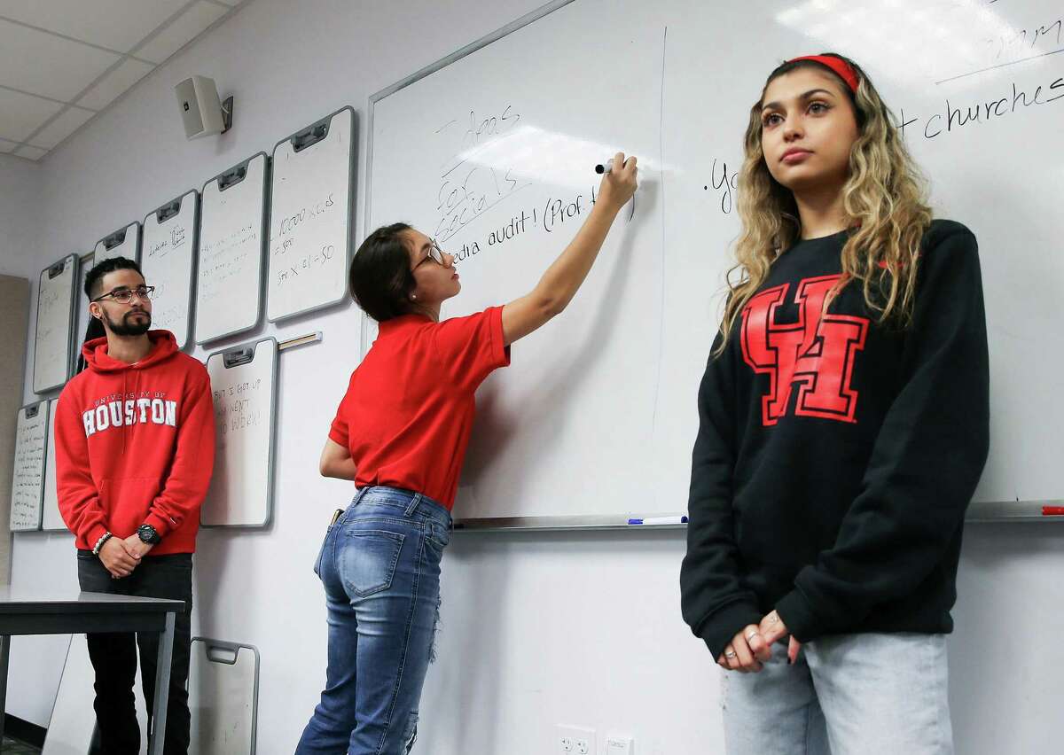 From left, University of Houston seniors Dylan Esquina, Mariana Cordero and Michelle Abrams work on a project last year for their Strategic Applications in Communications class.