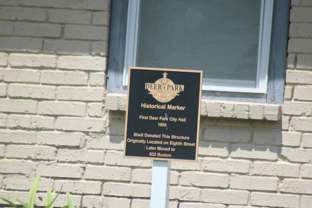 A historical marker is in front of Deer Park's first city hall building.