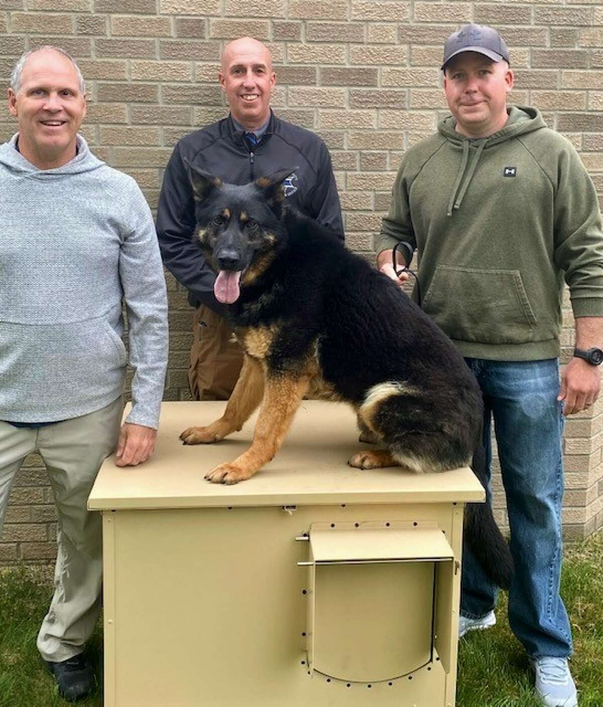 The Mecosta County Sheriff's Department recently underwent a transition of handlers. Sgt. Charlie Pippin (pictured far left) has taken possession of K-9 Zeke from his former handler and has begun training to ease both of them into their new working relationship.  