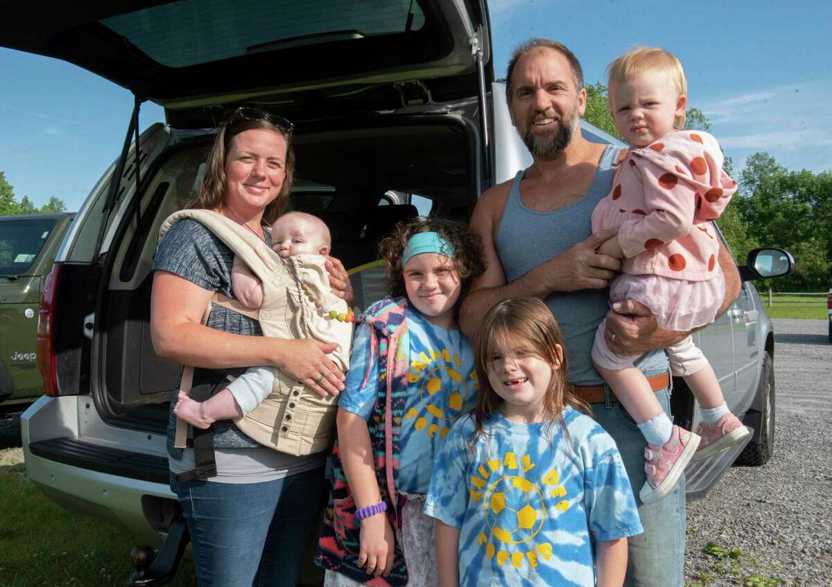 Michelle Fantauzzi, left, is seen with her family, from left, John, 5 mos, Julianna, 9, Annabelle, 7, husband Daniel and Gianna, 2, at Dockstader Recreation Park on Wednesday, June 8, 2022 in Galway, N.Y. Michelle started home-schooling her children during the pandemic.