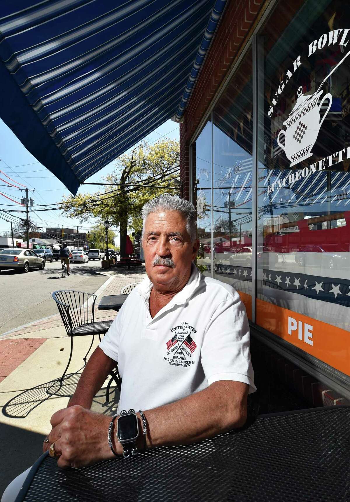 Owner Bobby Mazza poses at Sugar Bowl Luncheonette in Darien, Conn., on Tuesday May 10, 2022. The popular luncheonette will transfer ownership in late June after Mazza retires.