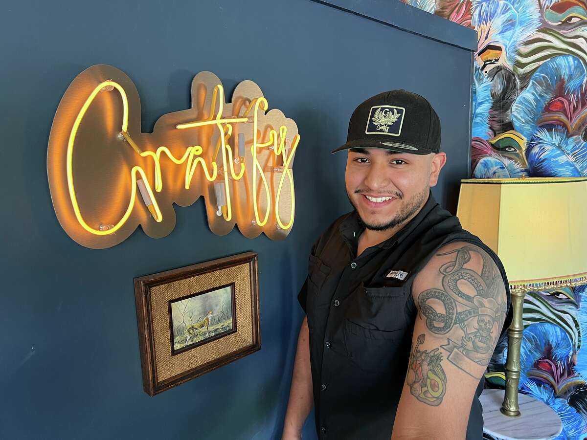 Big Vibe's Alfonso Canchola, who was the chef at Gratify but is now at Coppa Osteria, shows off his octopus and vegetable tattoos.