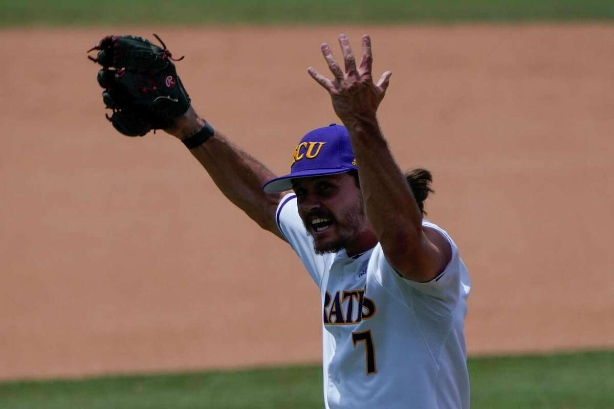 East Carolina pitcher C.J. Mayhue celebrates after striking out Texas's Dylan Campbell during the fifth inning of an NCAA college super regional baseball game Friday, June 10, 2022, in Greenville, N.C. (AP Photo/Chris Carlson)