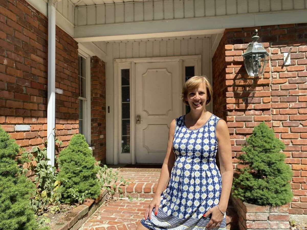 Deirdre Virvo in front of her latest property at 757 Long Hill Ave., which she plans to turn into a “unique boutique” senior living home identical to the one she opened at 62 Dogwood Lane in 2020.