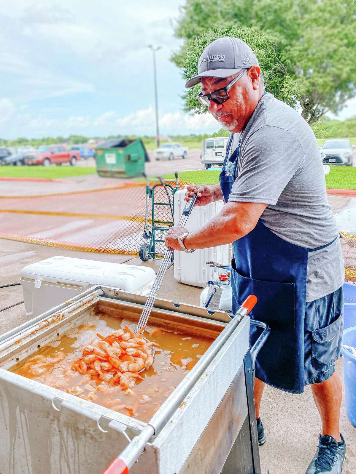 The Rose’s 33rd Annual Shrimp Boil and Fundraiser is slated for Saturday, June 18 at the Pasadena Convention Center. The event will raise funds to support breast health care services across Southeast Texas. Here, a member of The Rose Cooking Team boils shrimp at the 2021 event.