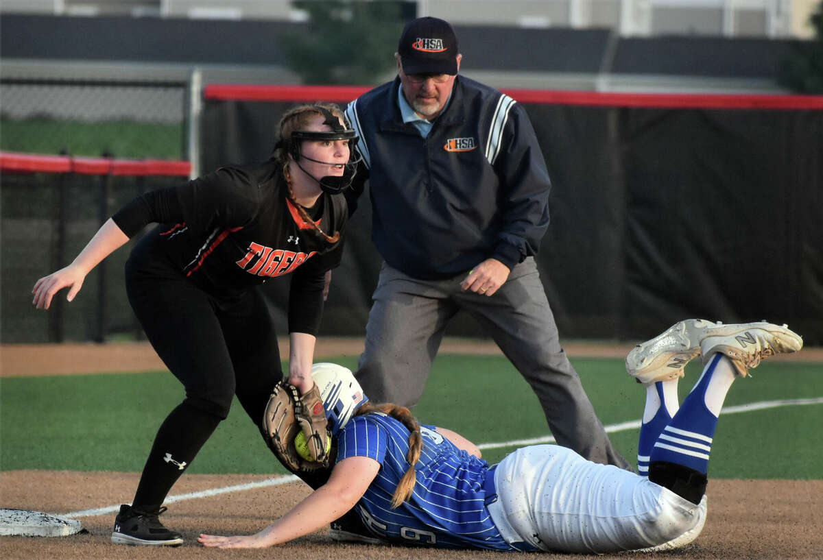 Edwardsville's Brooke Tolle tags out the runner at third against St. Charles North during the Class 4A state semifinals on Friday at the Louisville Slugger Sports Complex in Peoria.