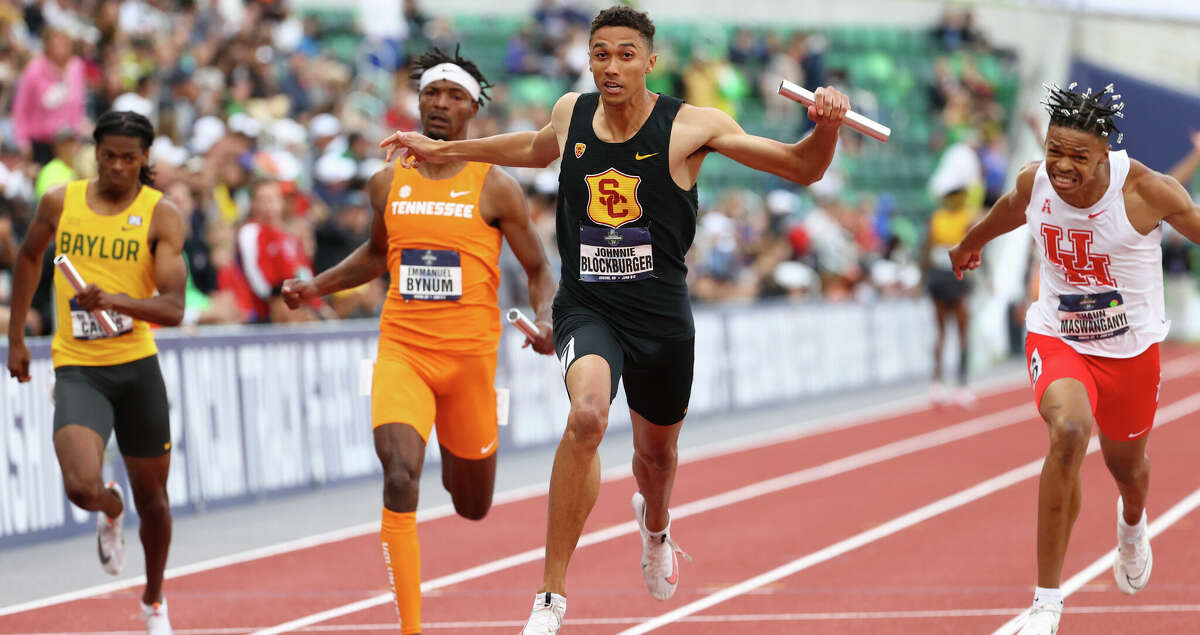 Johnnie Blockburger of USC Trojans crosses the finish line in the mens 4x100 meter relay during the Division I Men's and Women's Outdoor Track & Field Championships held at Hayward Field on June 10, 2022 in Eugene, Oregon. USC wins the mens 4x100 meter relay with a time of 38.49. (Photo by Andy Nelson/NCAA Photos via Getty Images)
