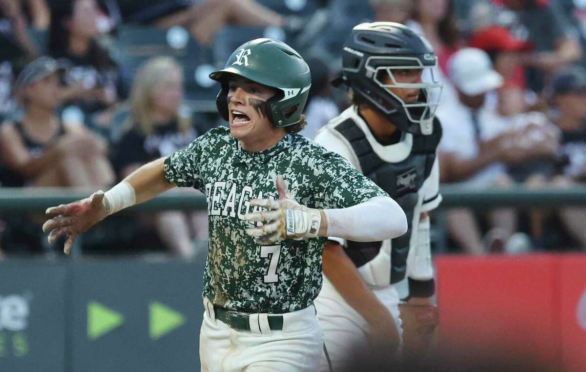 Reagan's Britton Moore (07) reacts after scoring a run in the third inning against Rockwall-Heath's during the Conference 6A baseball state semifinal game at Dell Diamond Field on Friday, June 10, 2022.