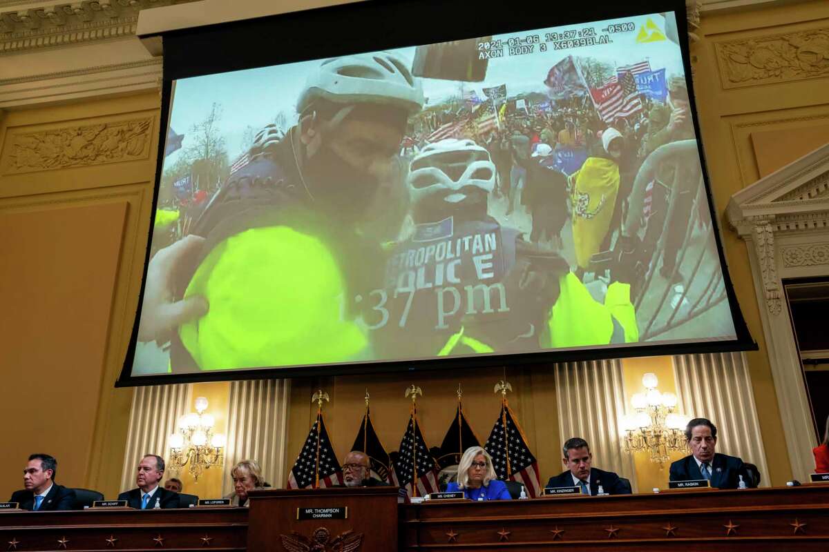 Body-camera footage of the mob incited by President Donald Trump attacking Capitol Police plays during the first public hearing of the House Select Committee to Investigate the January 6th Attack on the U.S. Capitol, on Capitol Hill in Washington on Thursday, June 9, 2022. The first night of the hearings was serious public service, but it told an engrossing story with the tools of a limited series drama. (Doug Mills/The New York Times)
