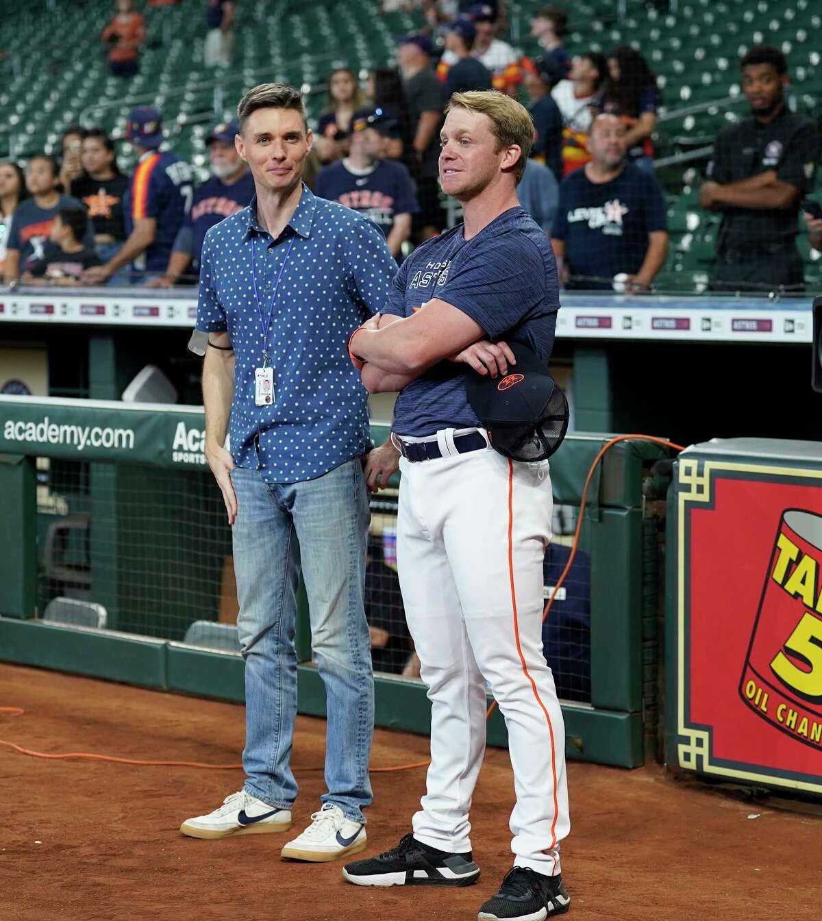 Andrew Ball, left, and Kyle Giusti, an assistant at HBU, and was part of the batting practice tryouts during BP before the start of an MLB game at Minute Maid Park on Saturday, June 11, 2022 in Houston.