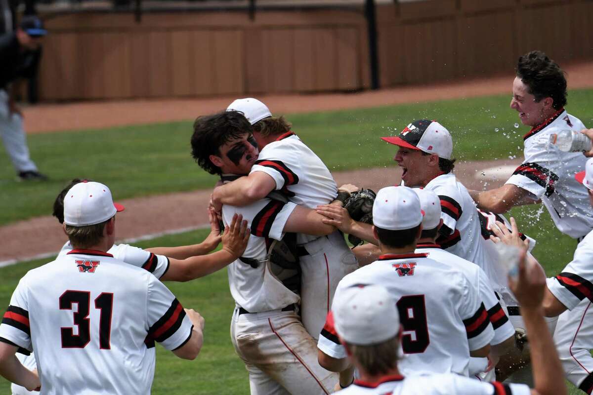 Fairfield Warde's Roman DiGiacomo lifts Paddy Galvin up after recording the final out in Fairfield Warde's 7-5 win over Southington in the Class LL baseball championship game at Palmer Field, Middletown on Saturday, June 11, 2022.