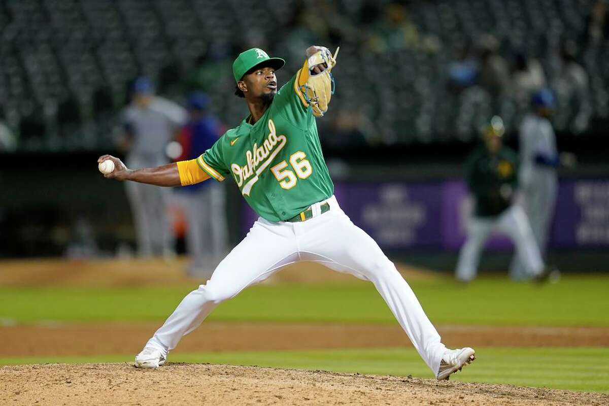 Oakland Athletics' Dany Jimenez during a baseball game against the Texas Rangers in Oakland, Calif., Friday, May 27, 2022. (AP Photo/Jeff Chiu)