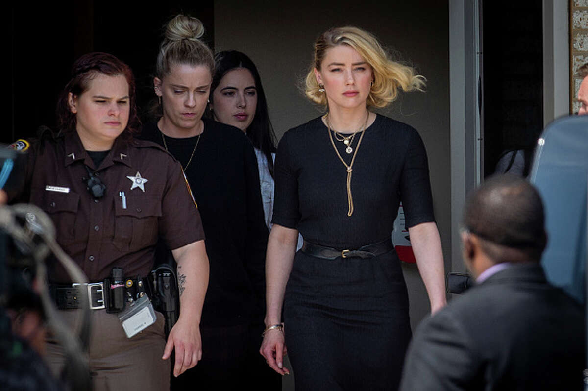 Actress Amber Heard leave the Fairfax County Courthouse in Virginia.