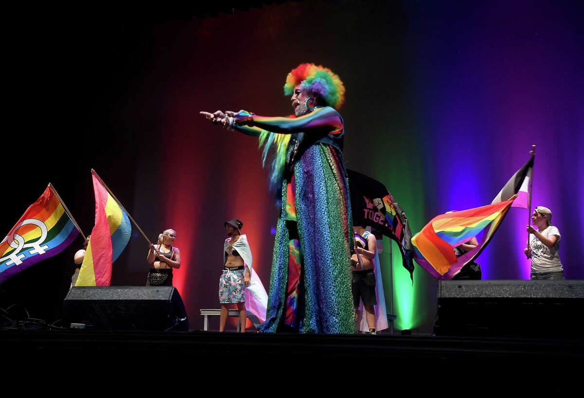 Olivia Gardner opens the performances during the annual PFLAG Beaumont Pride Fest at the Jefferson Theatre Saturday. Gardner has been the event opener since its beginnings in 2014. Photo made Saturday, June 11, 2022. Kim Brent/The Enterprise