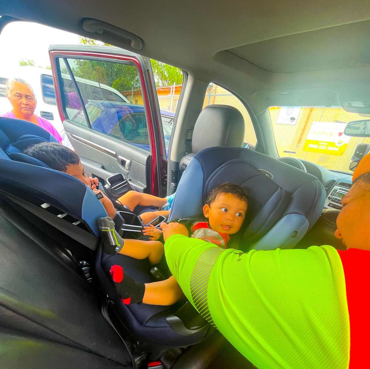 TxDOT officers inspect various car child seats in southern Webb County on June 10, 2022 to check if they are properly being used or adeqaute for protecting a child during a motorvehicle accident. 