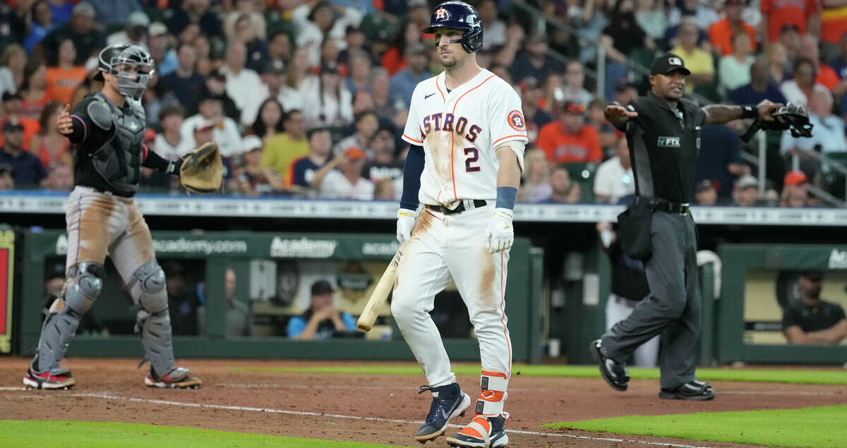 Houston Astros Alex Bregman (2) reacts after lining into a double play during the seventh inning of an MLB game at Minute Maid Park on Saturday, June 11, 2022 in Houston.