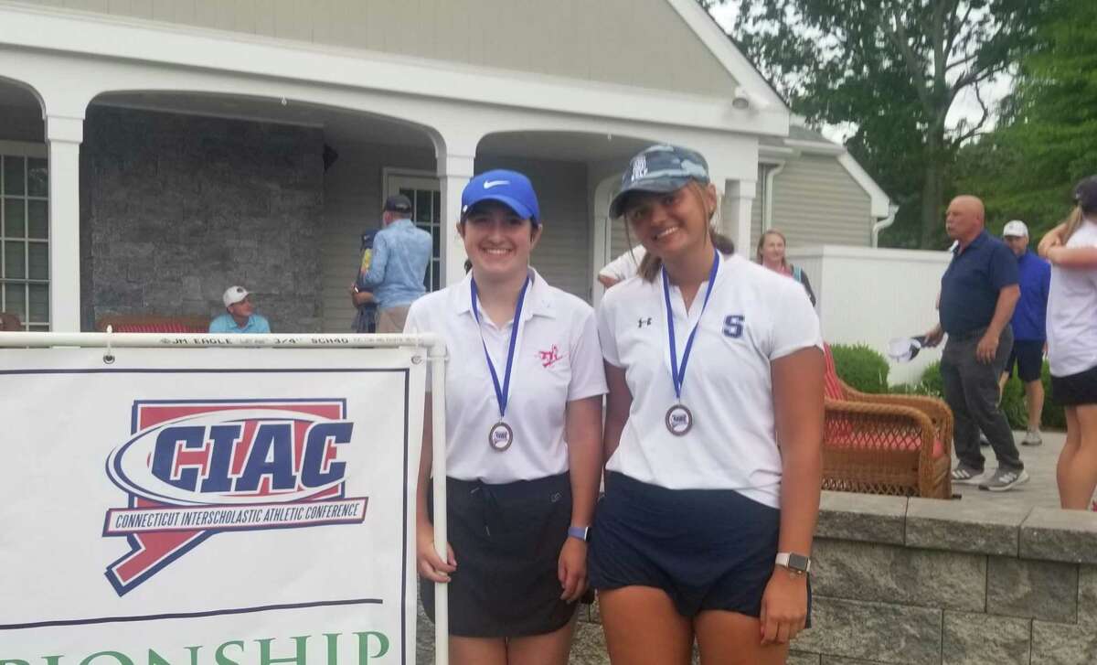 Libby Dunn of Berlin (left) and Anna Lemcke of Staples both shot 79 to share medalist laurels at the CIAC State Open at the Black hall Club June 11, 2022.