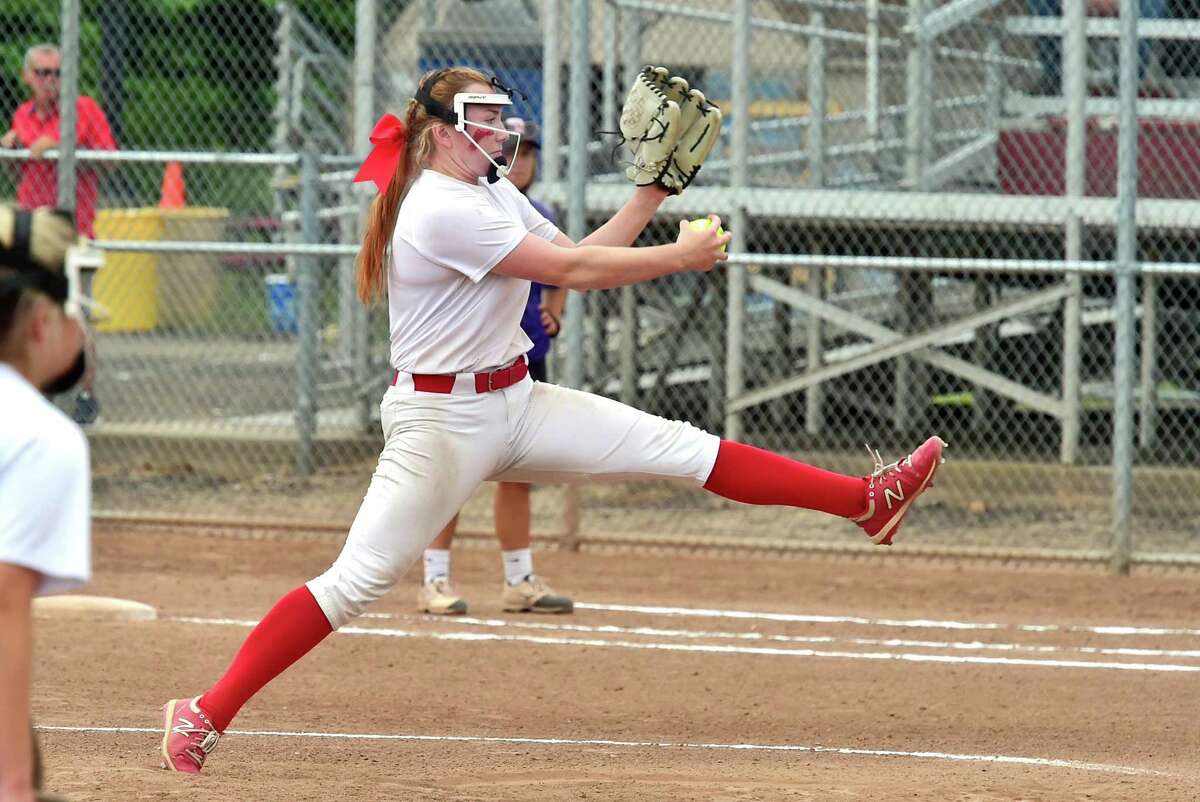 Cromwell’s Lily Kenney (11) pitches against North Branford during the Class S state championship at DeLuca Field in Stratford on Saturday.