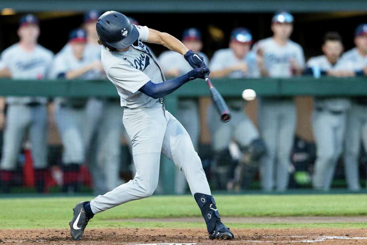 Connecticut's Korey Morton hits a two-run home run against Stanford during the second inning of an NCAA college baseball tournament super regional game Saturday, June 11, 2022, in Stanford, Calif. (AP Photo/John Hefti)