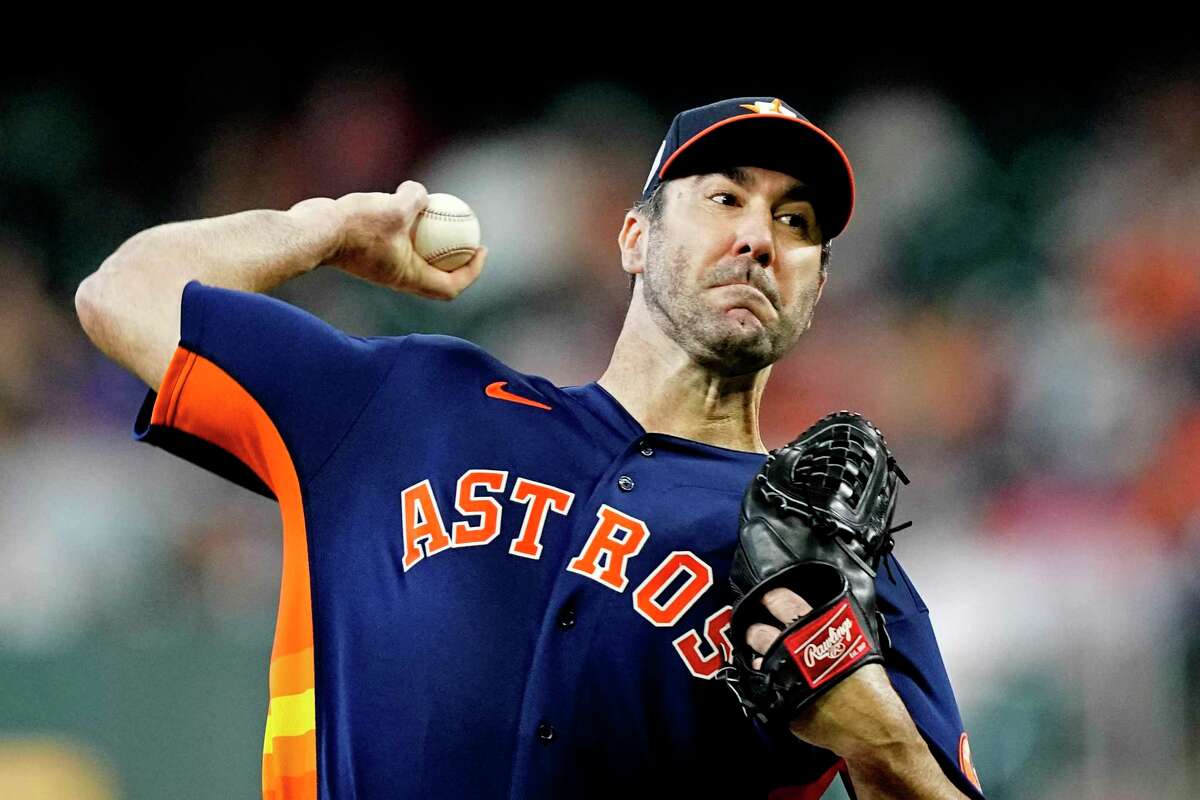 Houston Astros starting pitcher Justin Verlander throws against the Miami Marlins during the first inning of a baseball game Sunday, June 12, 2022, in Houston. (AP Photo/David J. Phillip)