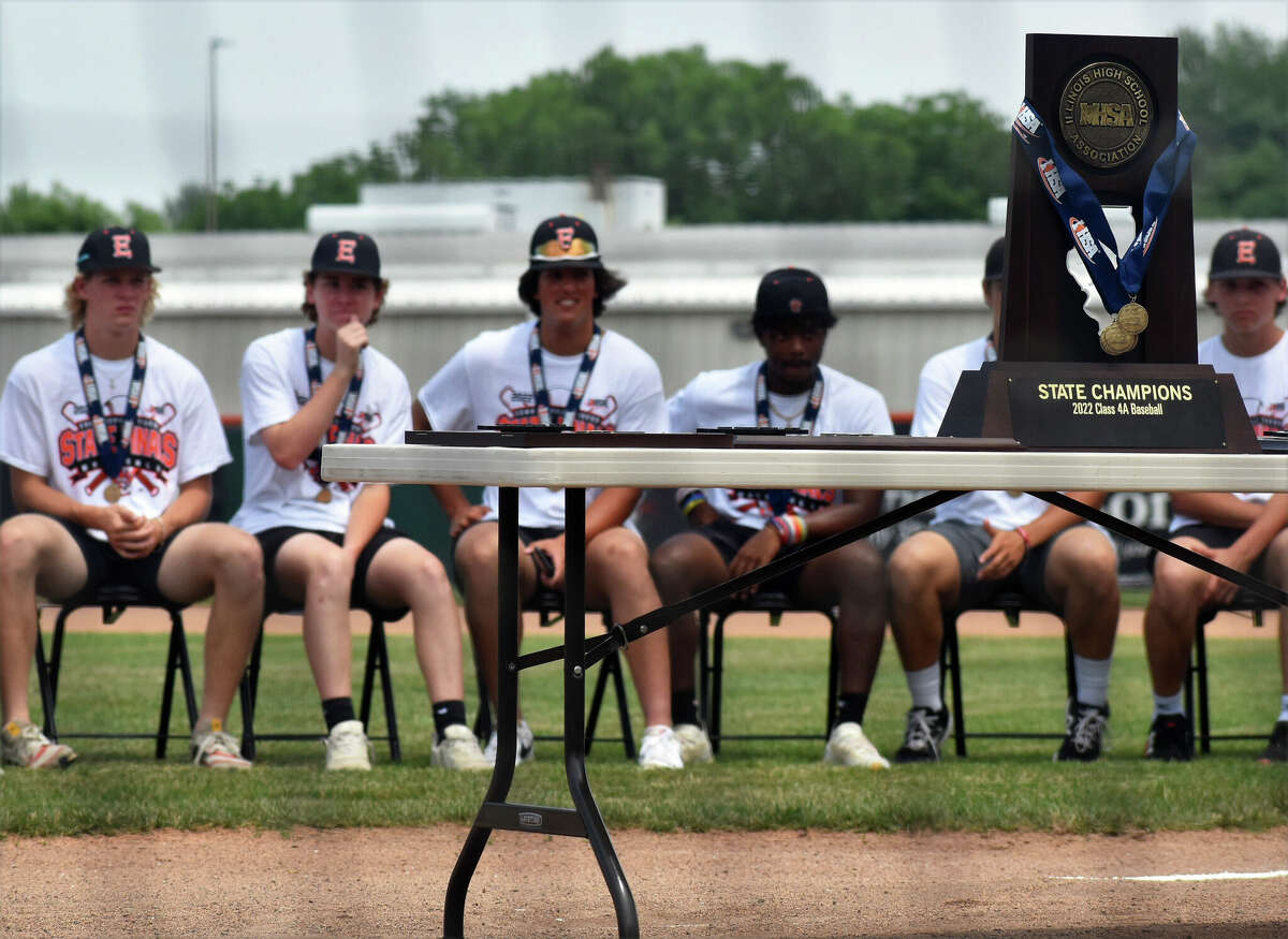 The Class 4A state championship trophy sits on a table in front of the Edwardsville players during a celebration on Sunday at Tom Pile Field.