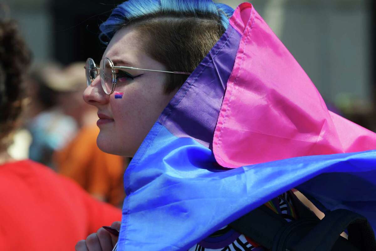 Cherylynn Burgess of Shaftsbury, VT, watches The Capital Pride Parade from along Lark St. on Sunday, June 12, 2022, in Albany, N.Y. (Paul Buckowski/Times Union)