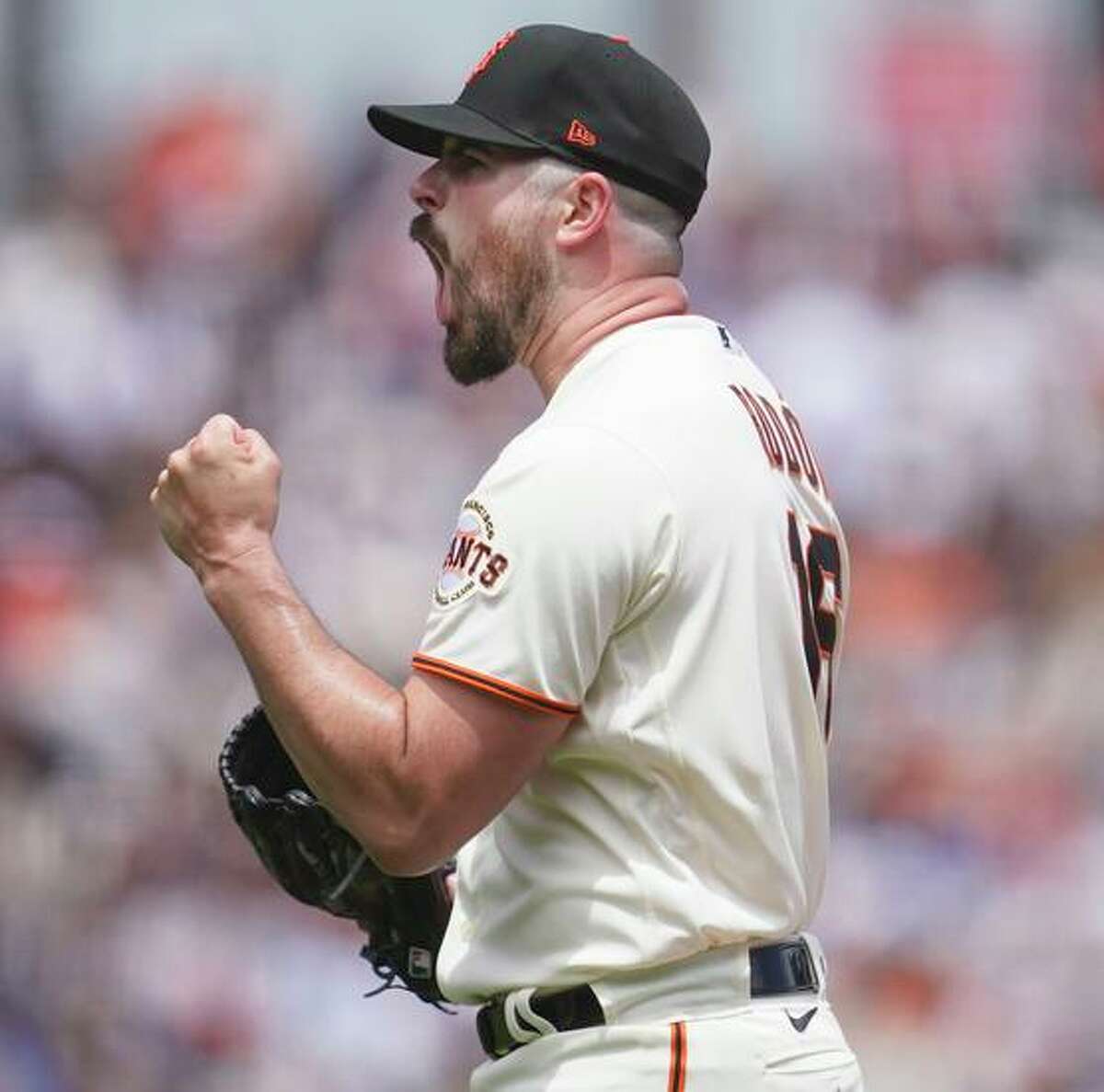 San Francisco Giants pitcher Carlos Rodon reacts after striking out Los Angeles Dodgers' Justin Turner during the fourth inning of a baseball game in San Francisco, Sunday, June 12, 2022. (AP Photo/Jeff Chiu)
