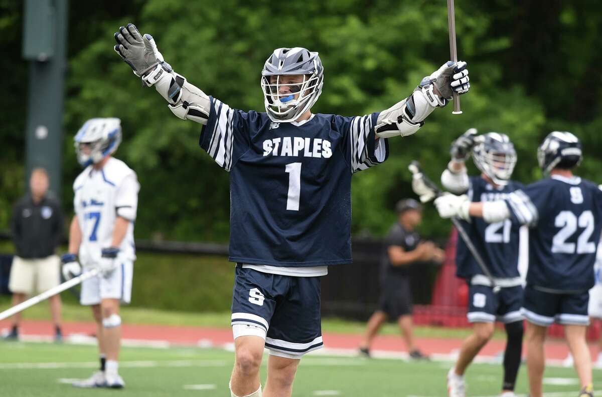 Staples' Tyler Clark (1) celebrates a goal against Darien during the CIAC Class L boys lacrosse final at Sacred Heart University on Sunday, June 12, 2022.