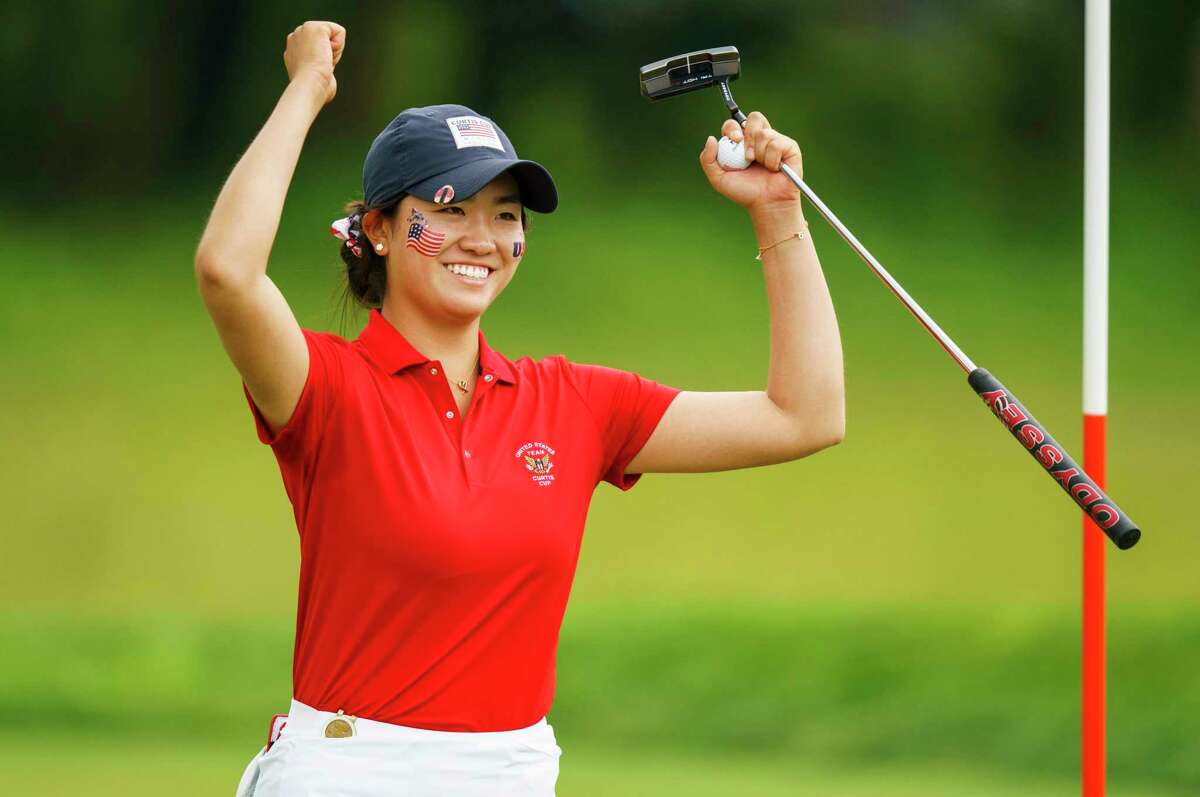 Stanford’s Rose Zhang celebrates clinching her match on the 13th hole during the final day of the Curtis Cup amateur golf match.