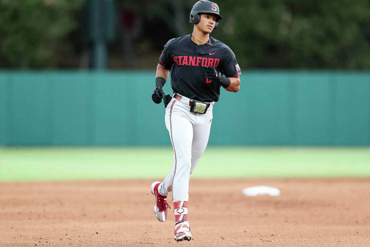 Stanford's Braden Montgomery runs the bases after hitting a three-run home run against Connecticut in the second inning of Game 2 of an NCAA college baseball super regional, on Sunday, June 12, 2022, in Stanford, Calif. (AP Photo/Kavin Mistry)