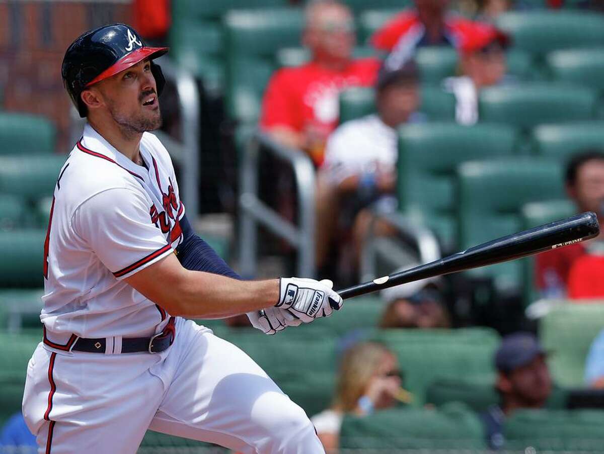 Adam Duvall of the Braves hits his second home run of the day during the fourth inning against the Pirates in Atlanta.