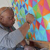 Robert Charles Hudson working on a painting. 