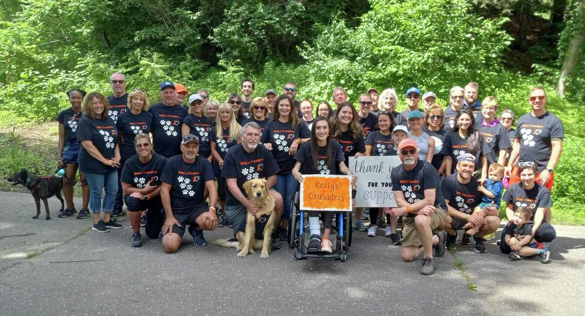 Kelly Considine held her third Complex Regional Pain Syndrome fundraiser Walk June 11 at the Winsted end of the Sue Grossman Still River Greenway. She was joined by about a group of family members and friends, who call themselves “Kelly’s Crusaders.” Considine has had the debilitating condition, CRPS, since college. She has lost the ability to walk or stand, and has severe pain and muscle spasms.