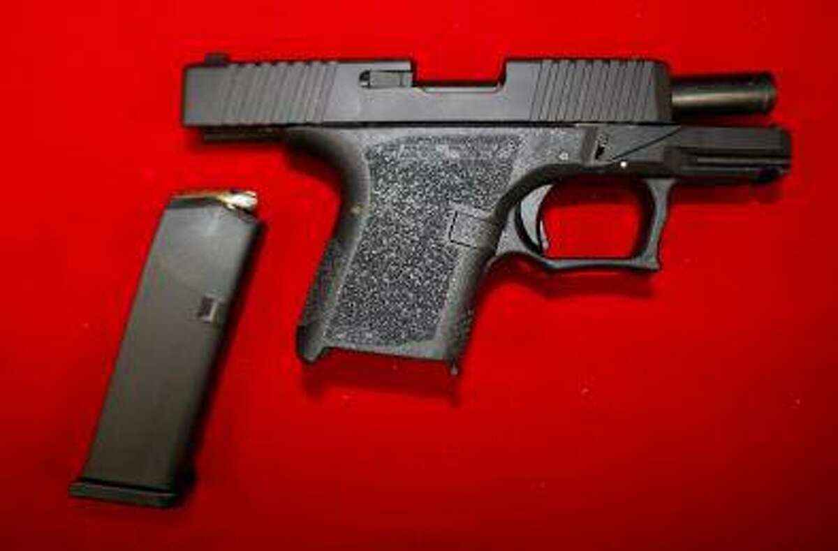 Police found a Waterbury teenager with this loaded Polymer 80 9 mm semi-automatic handgun Friday.