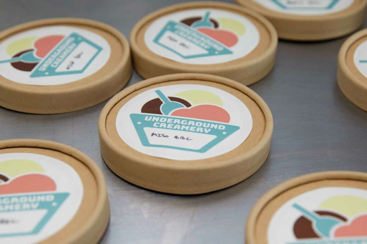 Underground Creamery owner Josh De Leon, 31, puts hand-written labels for the Miso Banana Brownie Caramel ice cream he is making Thursday, June 9, 2022, in Houston. De Leon started making ice cream in 2018. Today, he's making 400 pints for a customer base of 4,000 from the kitchen he shares with Pudgy’s Fine Cookies.