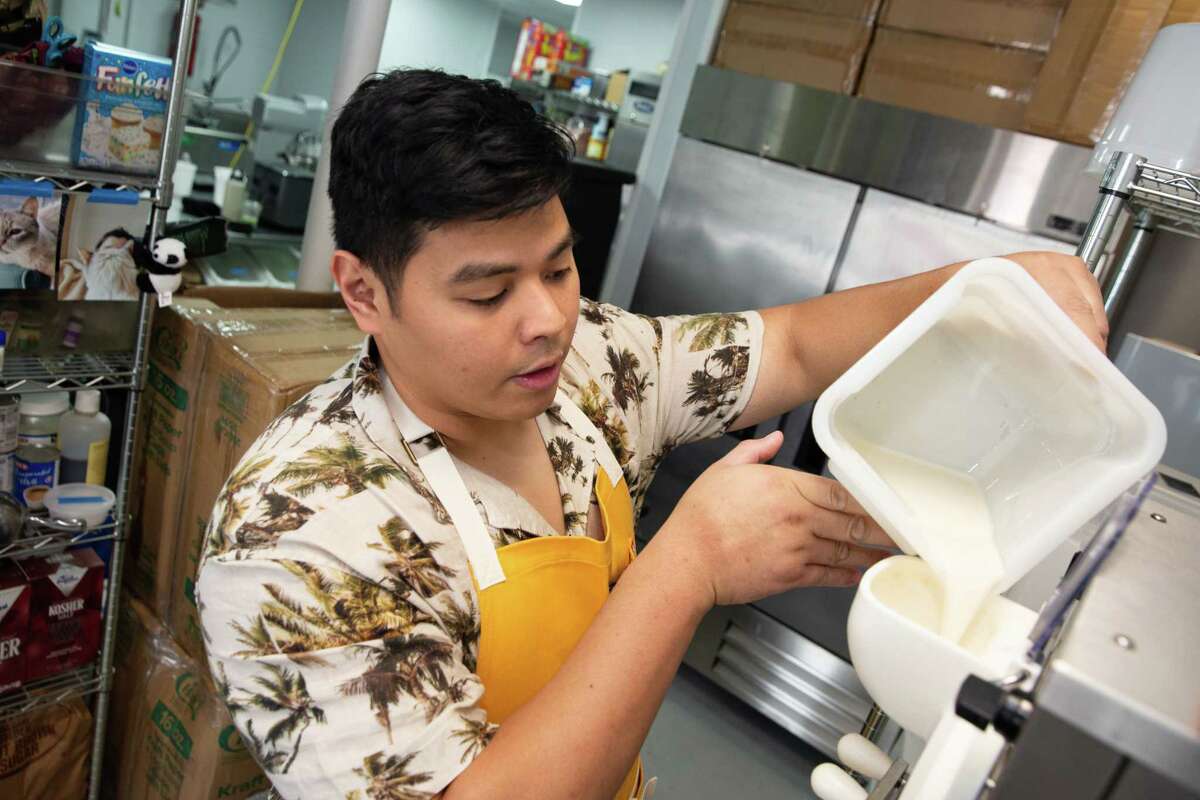 Underground Creamery owner Josh De Leon, 31, prepares a batch of banana ice cream at the kitchen he shares with Pudgy’s Fine Cookies Thursday, June 9, 2022, in Houston. De Leon started making ice cream in 2018. Today, he's making 400 pints for a customer base of 4,000.