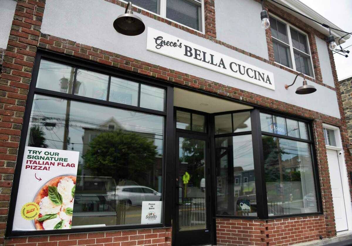 Express Pizza and Greco's Bello Cucina in the Chickahominy section of Greenwich, Conn. are photographed on Monday, June 13, 2022. After 34 years in business, Express Pizza and Greco's Bella Cucina are permanently closing, citing the rising cost of food and staffing challenges.