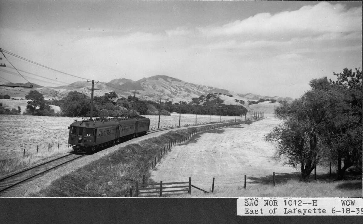 A westbound three-car train east of Lafayette on June 18, 1939.