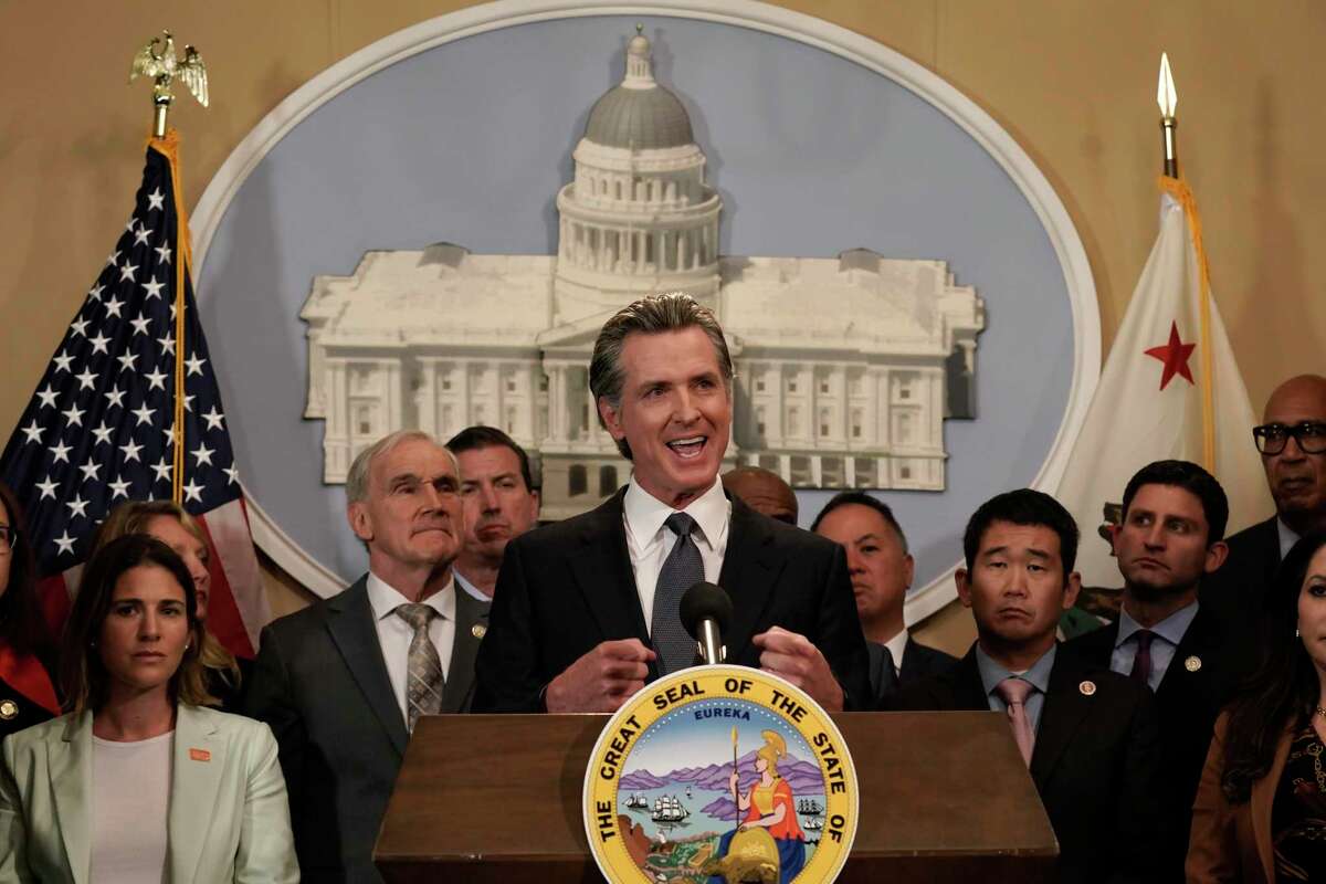 State lawmakers join California Gov. Gavin Newsom at a May 25 press conference discussing gun restrictions in the wake of the mass shooting in Uvalde, Texas.