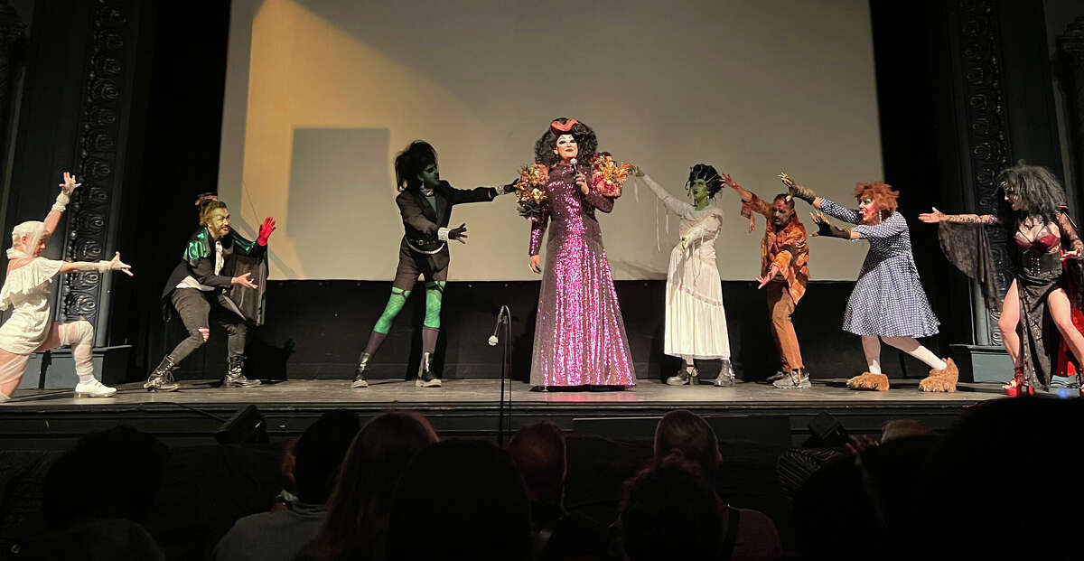 Peaches Christ, center, takes the stage during a cast and crew reunion of "All About Evil," held at the Victoria Theatre on June 11, 2022.