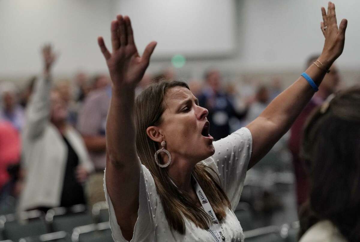 Krista Colyer worships during the Southern Baptist Convention's 2022 Annual Meeting on Monday, June 13, 2022, at the Anaheim Convention Center in Anaheim, Calif. She said she is working through breast cancer, and she is thankful to be worshipping through song. "Christ is enough right now," she said.