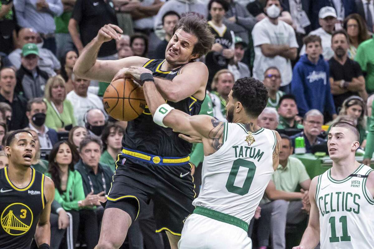 Nemanja Bjelica (8) has his shot blocked by Jayson Tatum (0) in the second half as the Golden State Warriors played the Boston Celtics in Game 4 of the NBA Finals at TD Garden in Boston, Mass., on Friday, June 10, 2022. The Warriors won 107-97 to tie the series at 2-2.