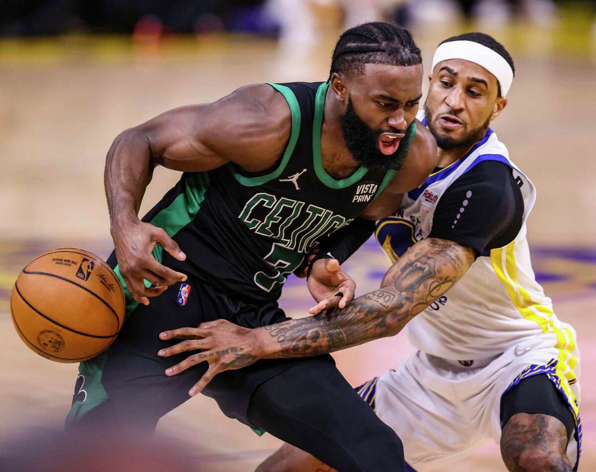 Gary Payton II knocks the ball from Boston’s Jaylen Brown during the fourth quarter of Game 5 of the NBA Finals at Chase Center. Payton had 15 points, five rebounds and three steals.