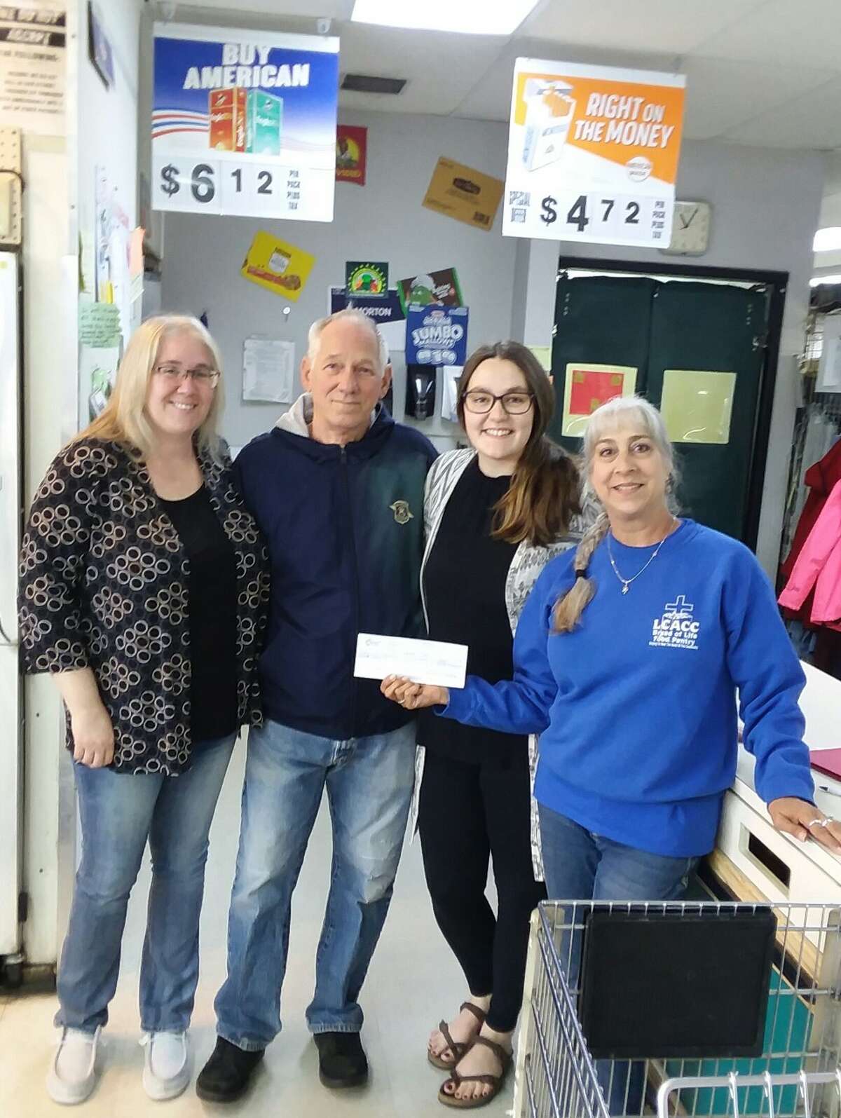 Bread of Life Pantry was presented with a donation of $!,566 from Houseman's "Donate at Checkout" campaign over Memorial Day Weekend. Pictured, left to right, are Darla Brandsetter, Kelly Morton, Gabrie Bolles, and Lynne Mills.  