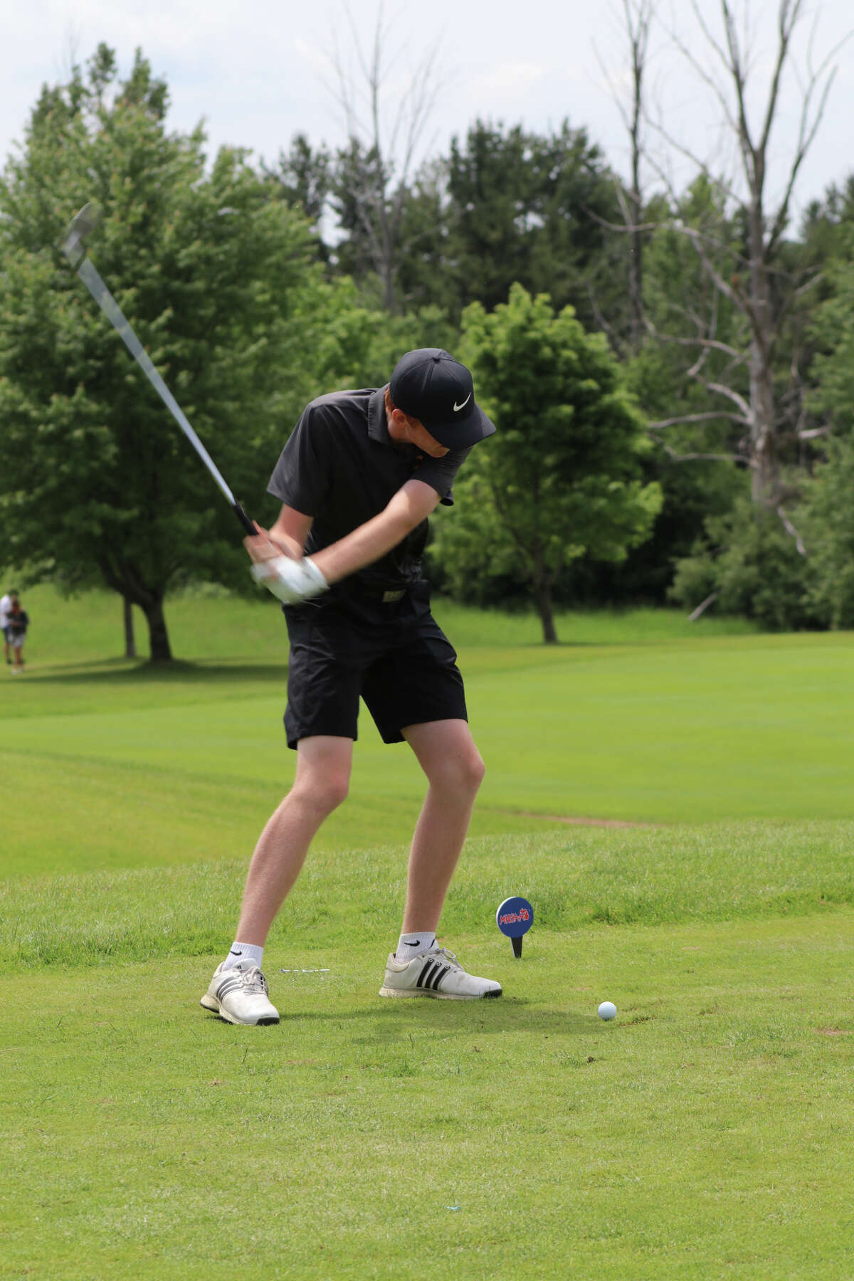 Dow High's Jacob O'Connor tees off during the Division 1 state final at Katke Golf Course in Big Rapids on Saturday, June 11, 2022.