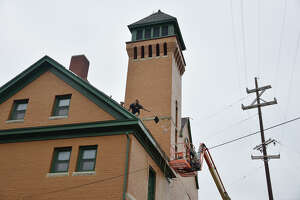 Photos: Manistee City Fire Department roof work ongoing