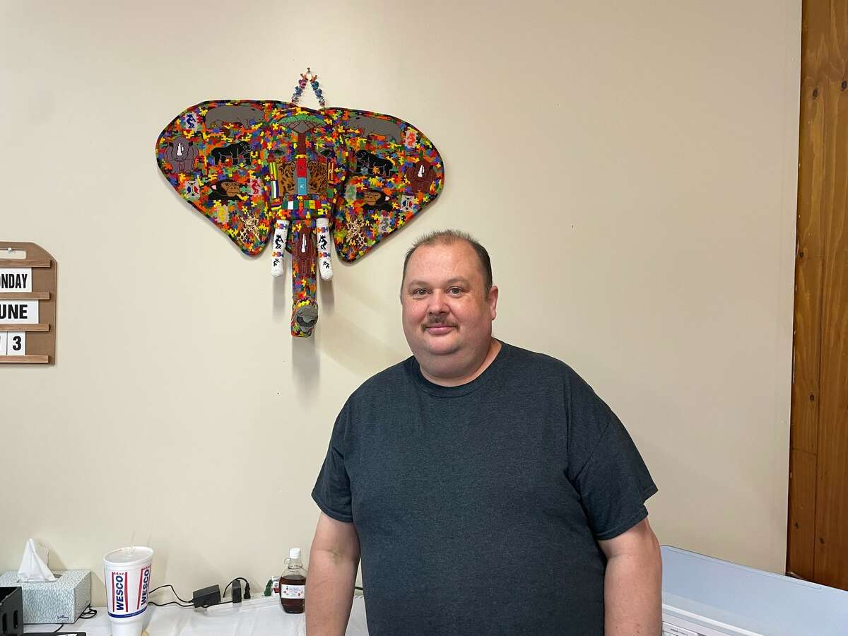 Homemade & More is a new consignment shop in downtown Reed City with custom creations from the owner Kris Cross. Cross in front of his beadwork elephant that took him three months and over one million beads to complete.