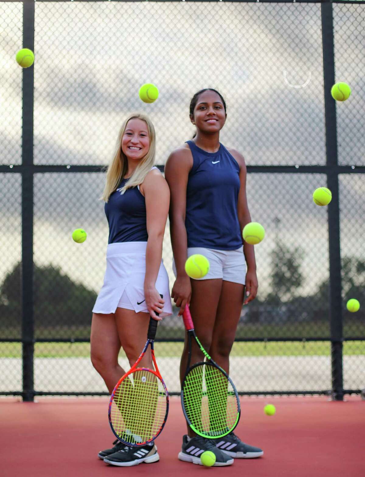 Bridgeland’s Emma Eads, left, and Divya Tulluri are the All-Greater Houston girls co-tennis players of the year.