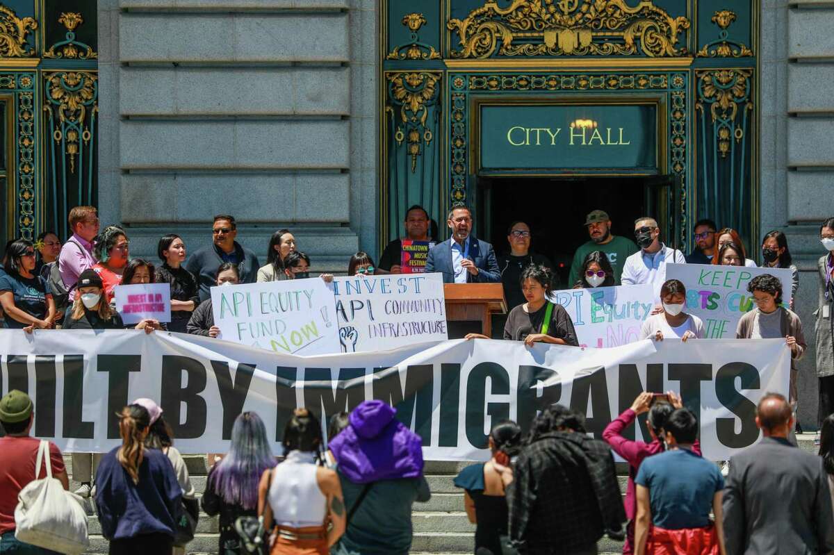 Supervisor Ahsha Safai discusses a proposal to invest $118 million in San Francisco’s Asian and Pacific Islander communities during a press conference outside City Hall on Tuesday, June 14, 2022.